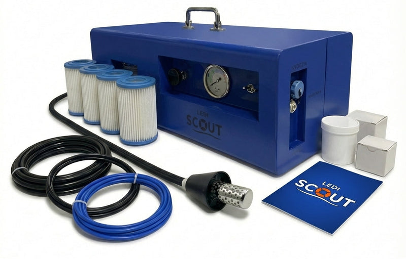 Blue filtration system with filters, hoses, and accessories on a white background